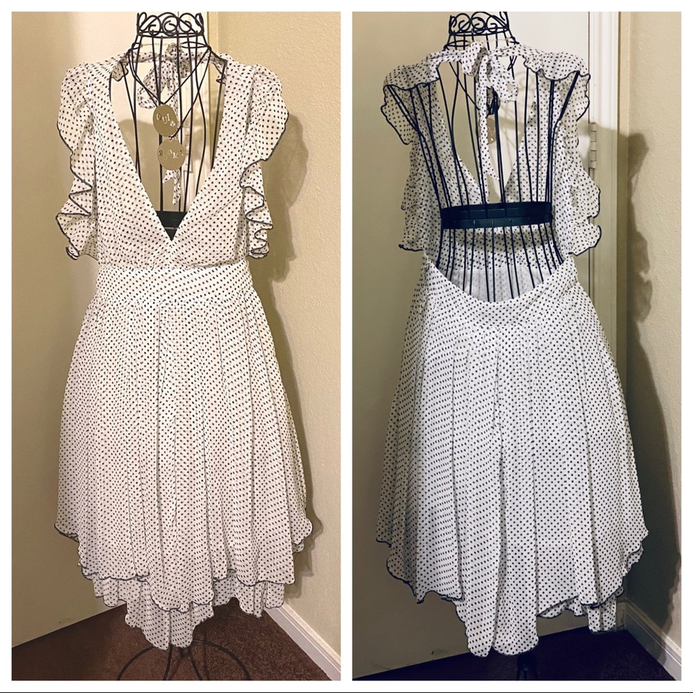 Fumblin Foe Polka dot flirty dress. Side zipper